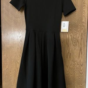 LuLa Roe black dress, side pockets, new, size XXS